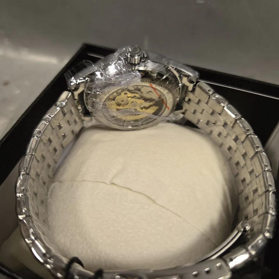 BOXED GLOBENFIELD EXHIBITION DIAL GENTS WATCH WITH SKELETON BACK CASE AND METAL STRAP