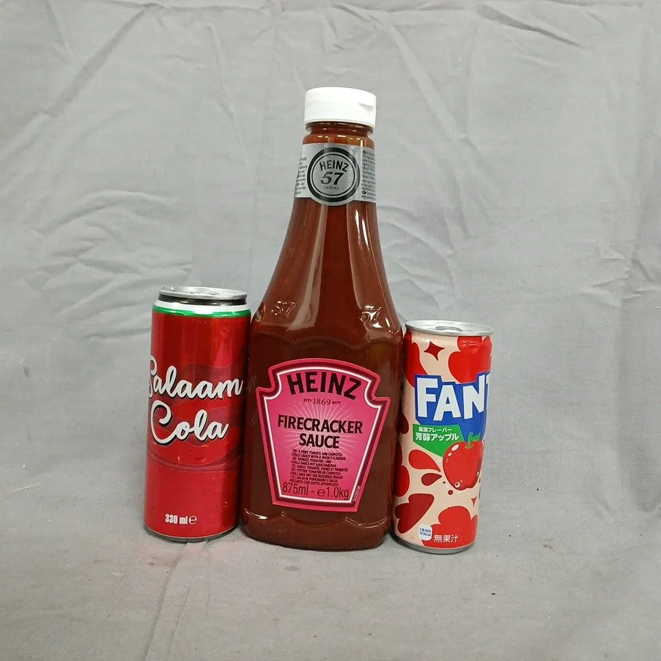 APPROXIMATELY 10 ASSORTED FOOD AND DRINK ITEMS TO INCLUDE FANTA, FIRECRACKER SAUCE, ETC