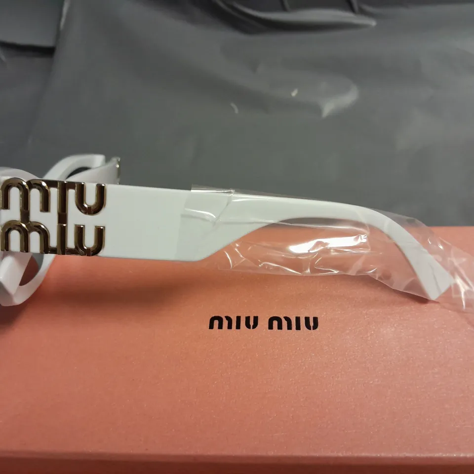 BOXED PAIR OF MIU MIU WHITE CHUNKY FRAMED GLASSES