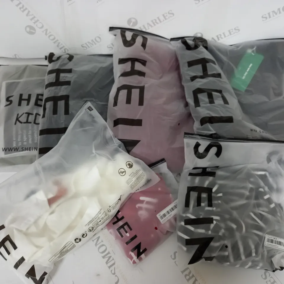 APPROXIMATELY 18 ASSORTED SHEEN CLOTHING IN VARIOUS COLOURS AND SIZES TO INCLUDE TOPS, TROUSERS, SKIRTS