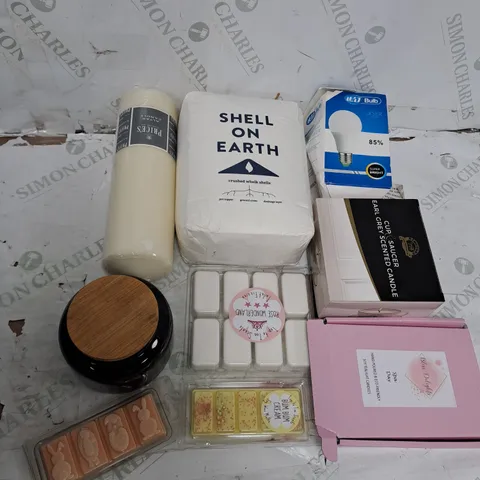 TOTE OF ASSORTED HOUSEHOLD ITEMS TOO INCLUDE CANDLES , WHELK SHELLS , LIGHTBULBS , ETC