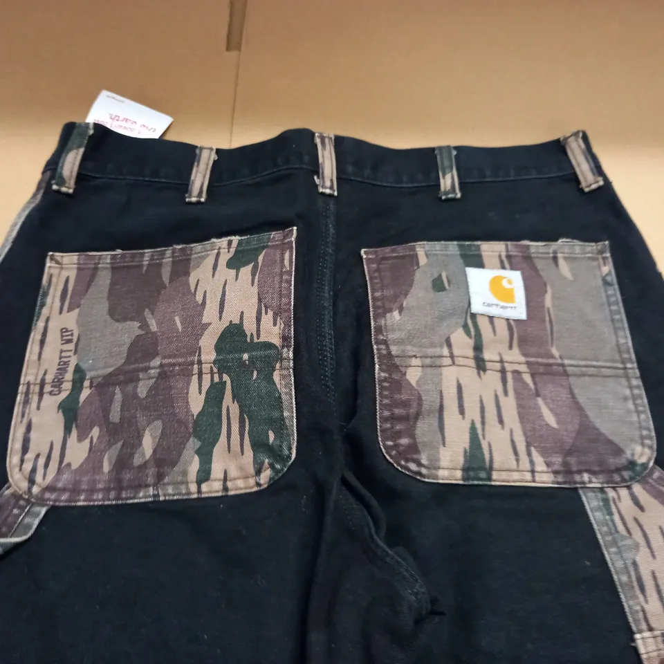 CARHARTT CAMO & BLACK JEANS - 30" X 32"
