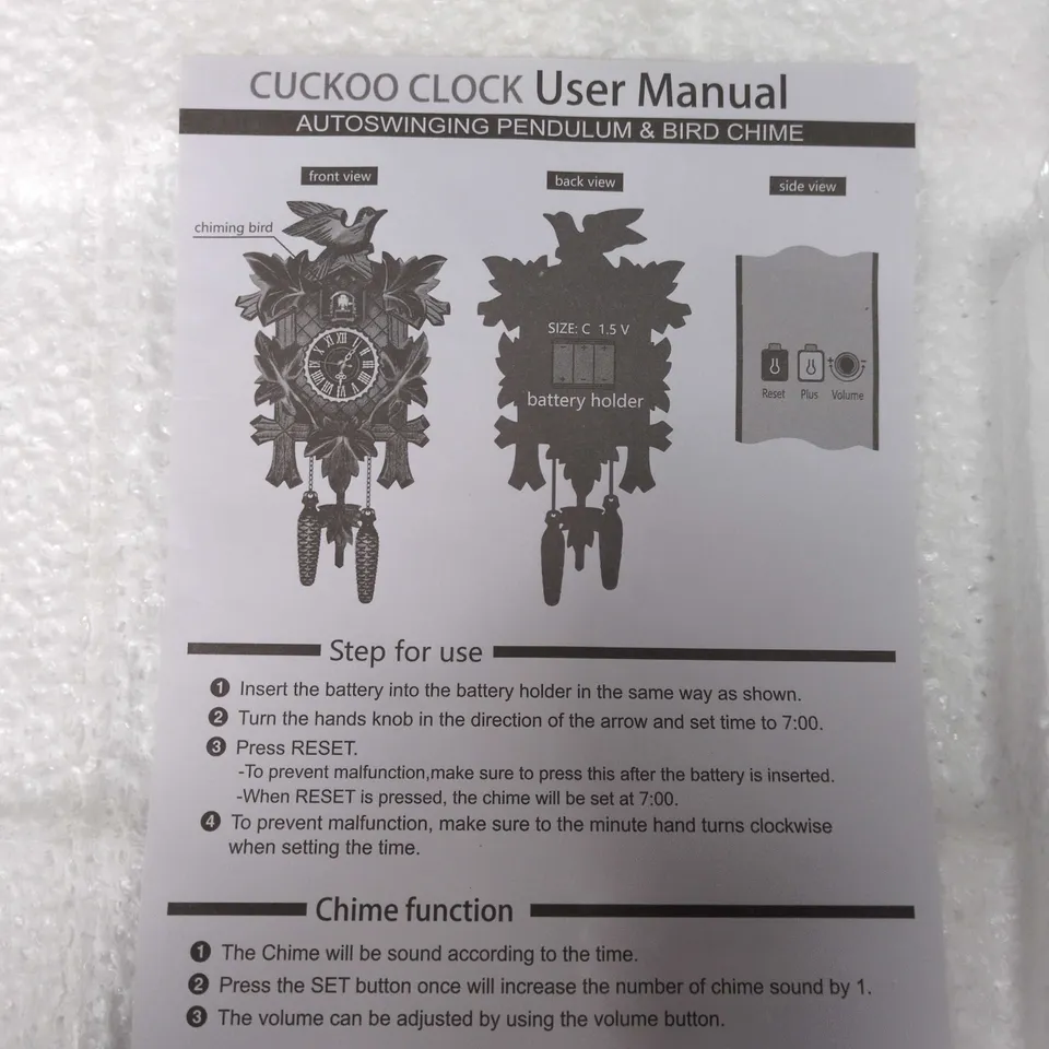 WOODEN CUCKOO CLOCK WITH CARVED LEAVES AND BIRD MOTIF