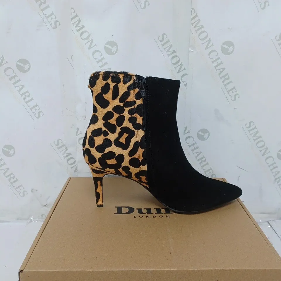 BOXED PAIR OF DUNE HEELED BOOTS IN LEOPARD SIZE 7 