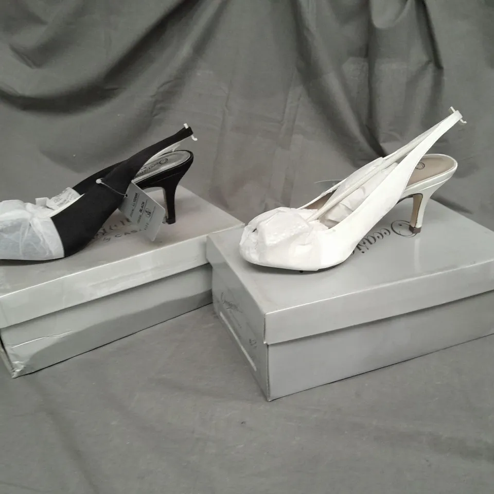 APPROXIMATELY 6 BOXED PAIRS OF LOW PROFILE HIGH HEELS, 4 BLACK AND 2 IVORY