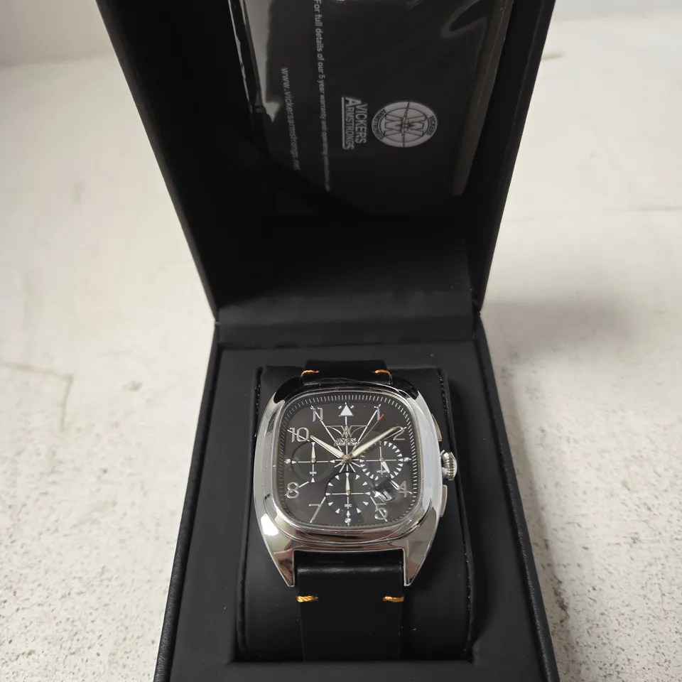 VICKERS ARMSTRONGS WRISTWATCH – STAINLESS STEEL CASE, BLACK CHRONOGRAPH DIAL, LEATHER STRAP (BOXED)