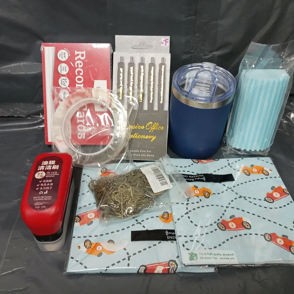 APPROXIMATELY 12 ASSORTED HOUSEHOLD ITEMS TO INCLUDE PEN SET, SERVING NAPKINS, TAPE. ETC
