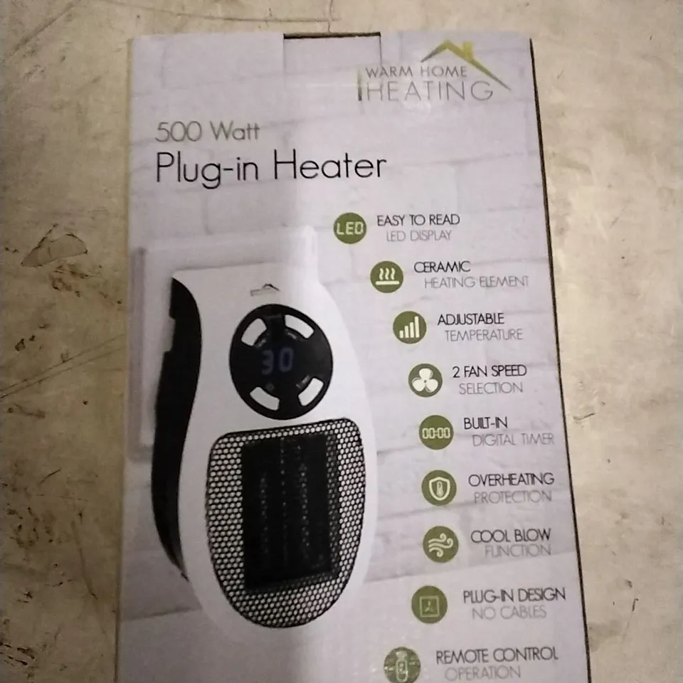 WARM HOME CERAMIC PLUG IN HEATER