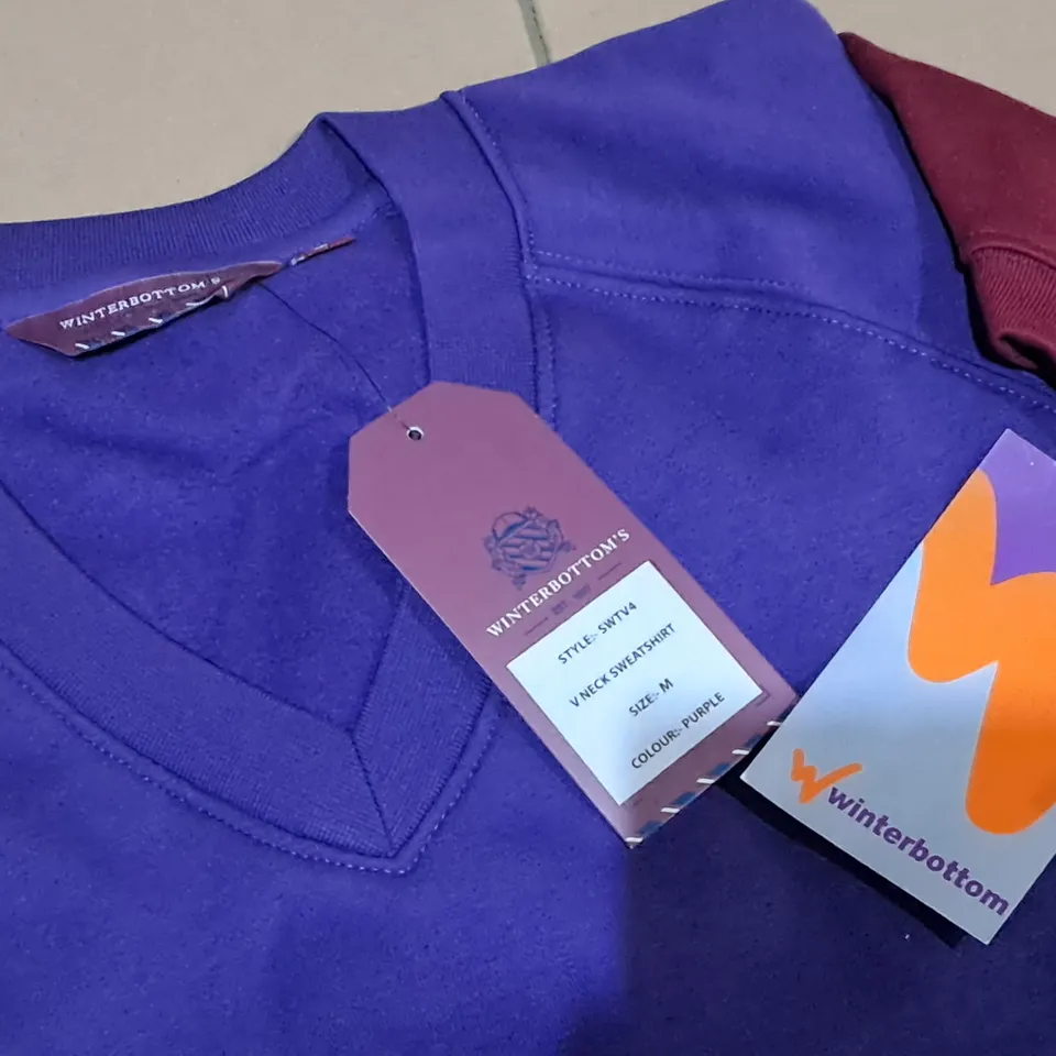 LOT OF APPROXIMATELY 100 BAGGED WINTERBOTTOM JUMPERS IN VARIOUS SIZES