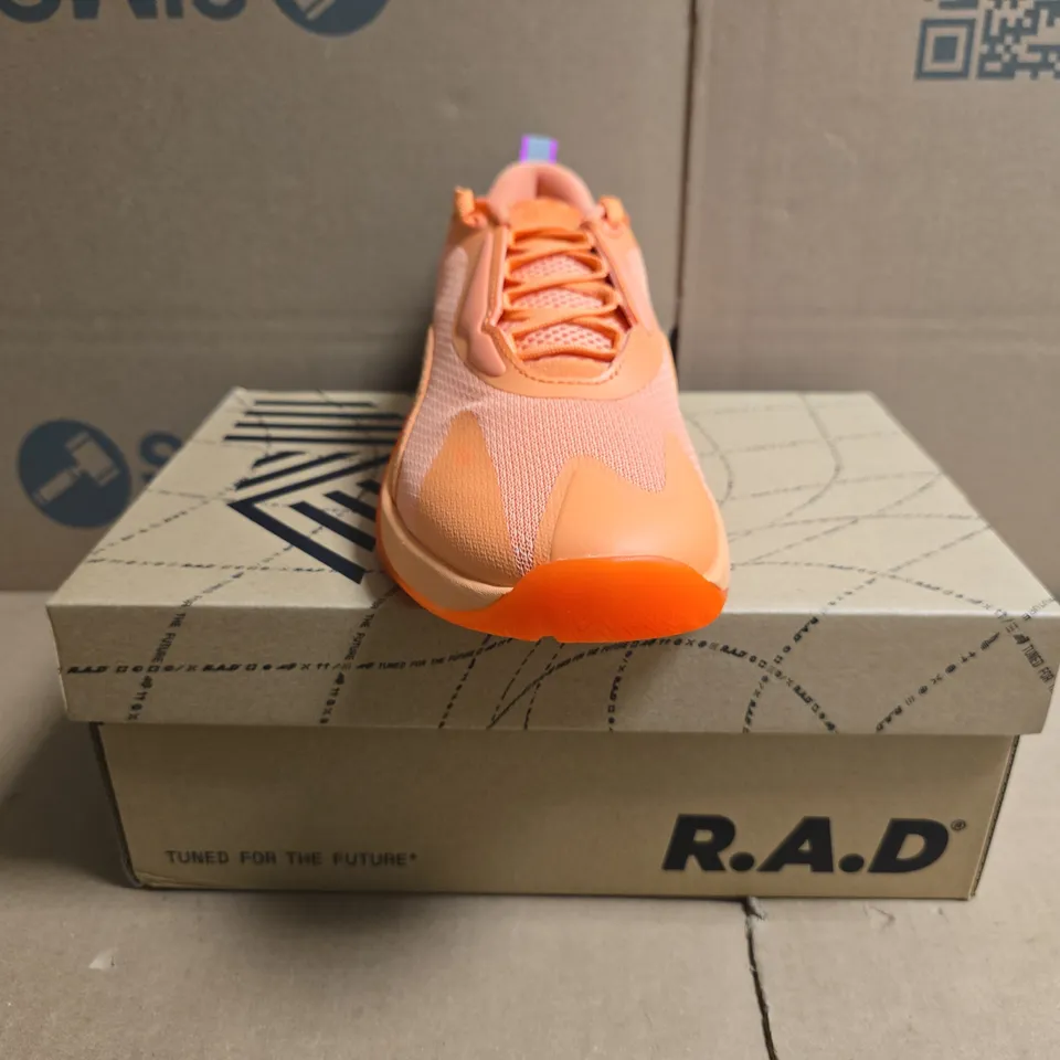 BOXED PAIR OF R.A.D ONE V2 TRAINERS IN CADMIUM ORANGE/VIVID FUCHSIA SIZE UK 6