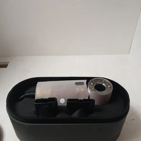 DYSON NURAL WITH OVAL BLACK STORAGE OTTOMAN WITH RED TRIM
