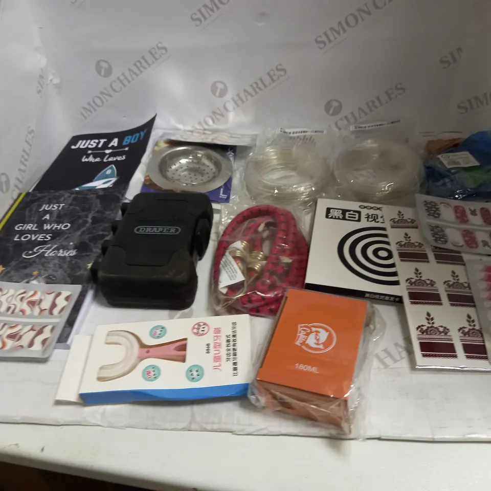 LOT OF ASSORTED HOUSEHOLD GOODS TO INCLUDE SINK STRAINER, NOTEBOOKS, AND LED STRIP LIGHTS ETC.