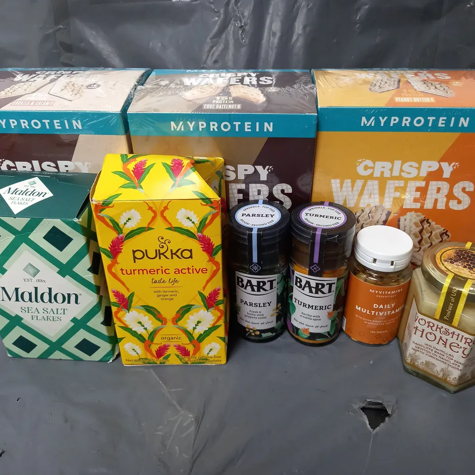 APPROXIMATELY 10 ASSORTED FOOD & DRINK ITEMS TO INCLUDE - MYPROTEIN CRISPY WAFERS - MYVITAMINS DAILY MULTIVITAMIN - YORKSHIRE HONEY - ETC