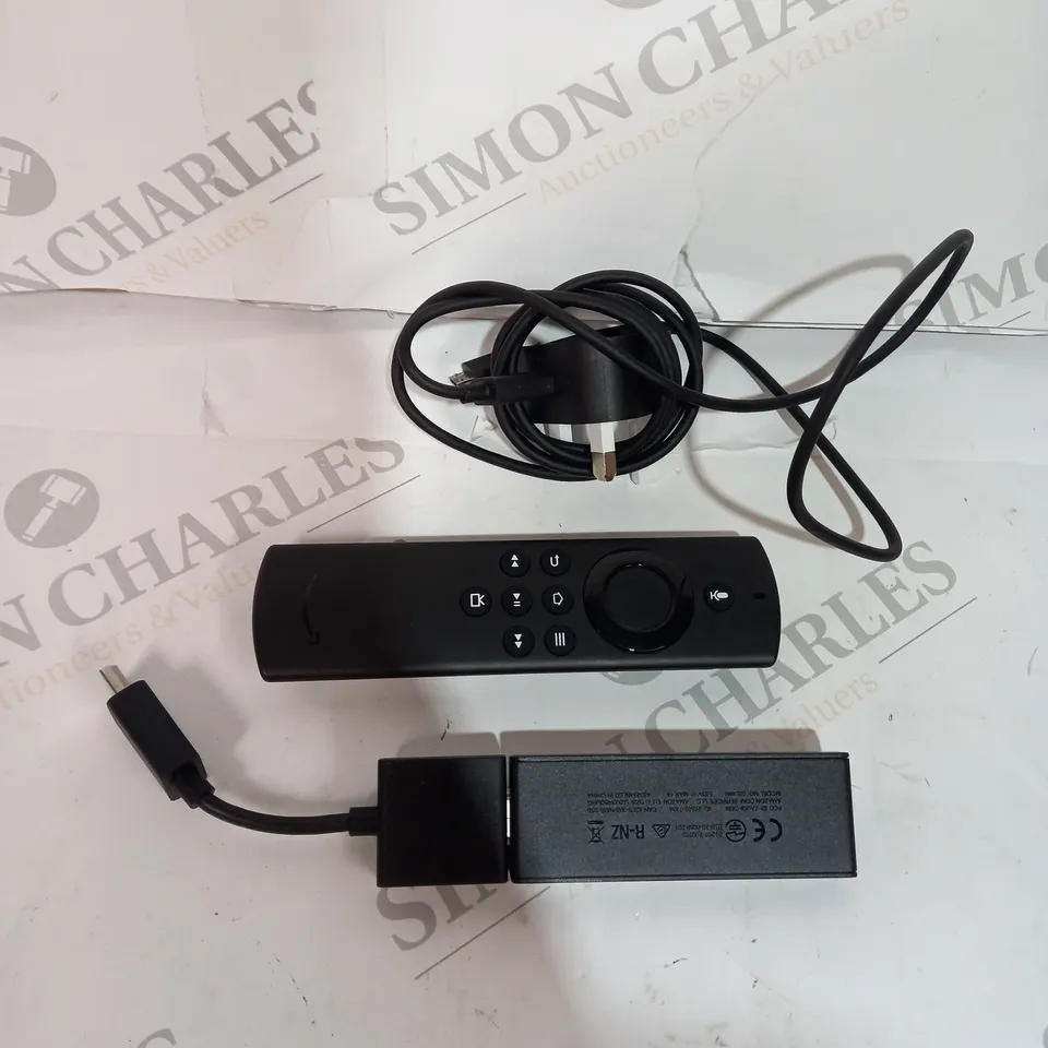 JOB LOT ASSORTED AMAZON FIRE STICKS REMOTES AND CHARGER WIRES