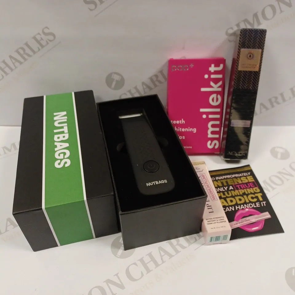APPROXIMATELY 20 ASSORTED HEALTH AND BEAUTY PRODUCTS TO INCLUDE NUTBAG GROOMER, TEETH WHITENING STRIPS, TOO FACED LIP PLUMPER, ALIVER 2-IN-1 FOUNDATION & BRUSH ETC.