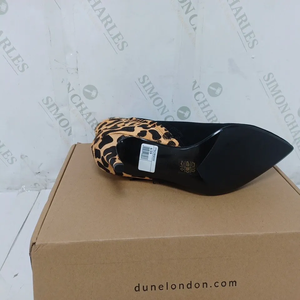 BOXED PAIR OF DUNE HEELED BOOTS IN LEOPARD SIZE 6
