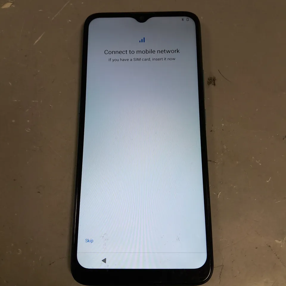 UNBOXED MOTOROLA MOBILE PHONE - TEAL