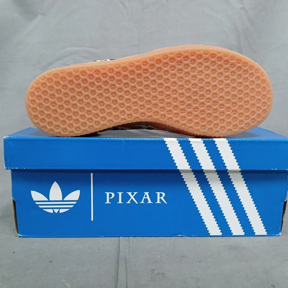 BOXED PAIR OF ADIDAS PIXAR GAZELLE SHOES IN ORANGE/MULTI SIZE UK 2