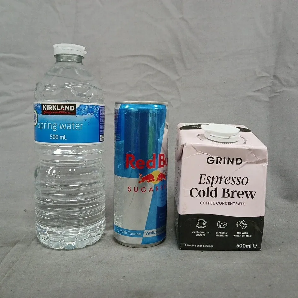 APPROXIMATELY 10 ASSORTED FOOD AND DRINK ITEMS TO INCLUDE RED BULL, GRIND, ETC