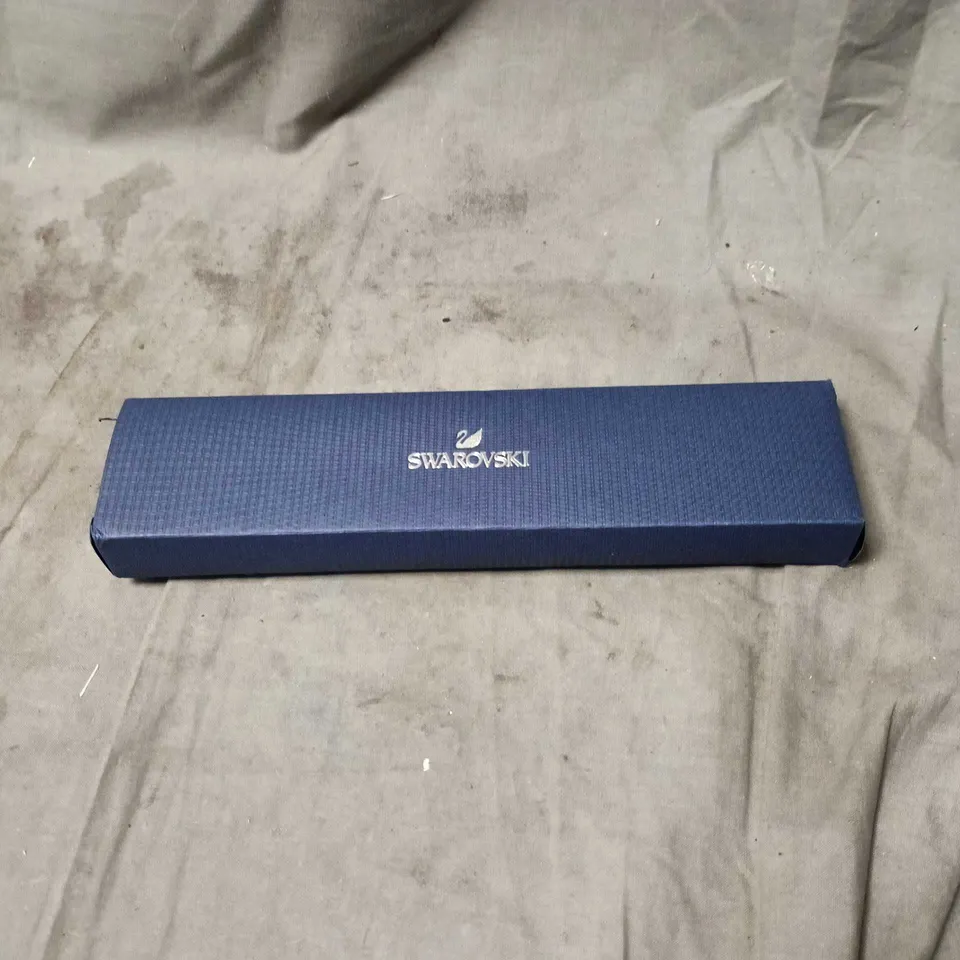 SWAROVSKI TENNIS BRACELET WITH LOVE HEART, IN BOX