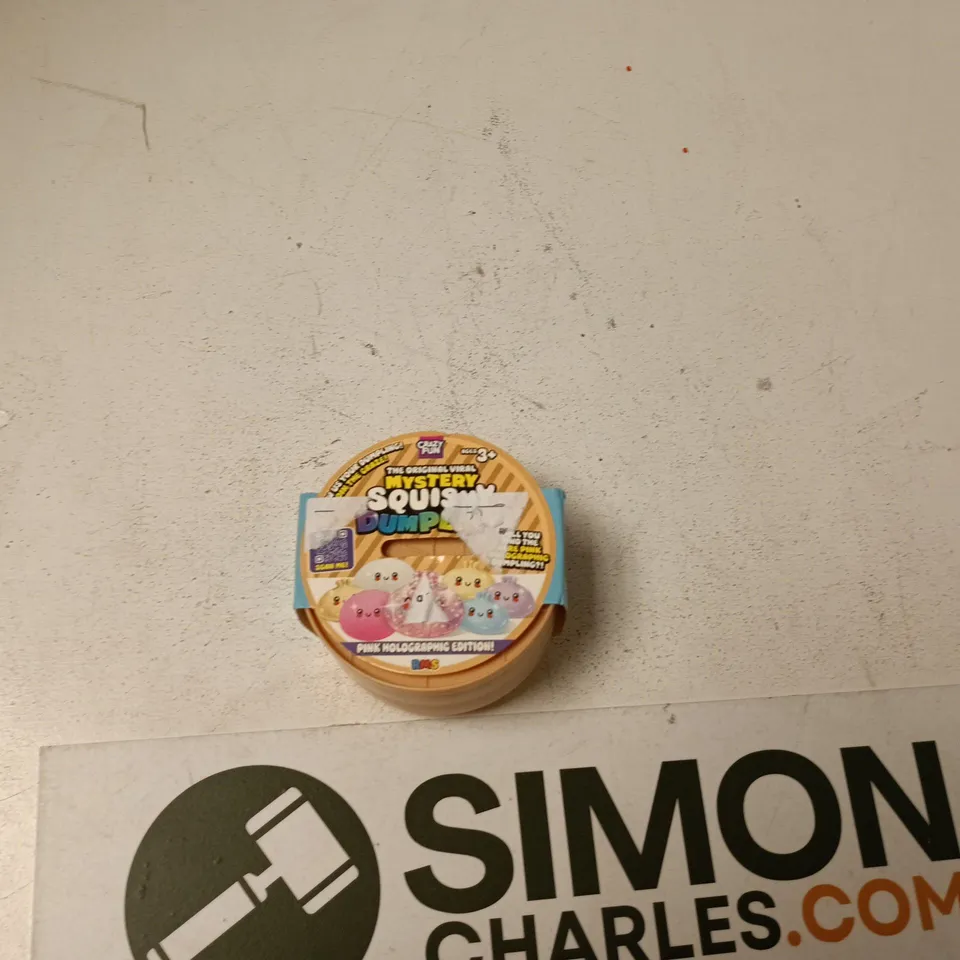 Mystery Squish Dump Capsule – Pink Holographic Edition (Toy)