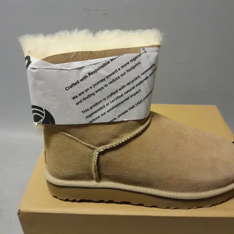 BOXED PAIR OF UGGS MINI BAILEY BOW II IN SAND - UK 7