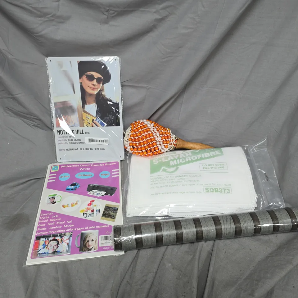 APPROXIMATELY 20 ASSORTED HOUSEHOLD PRODUCTS TO INCLUDE NOTTING HILL METAL FILM POSTER, MARACAS, WALL VINYL, ETC