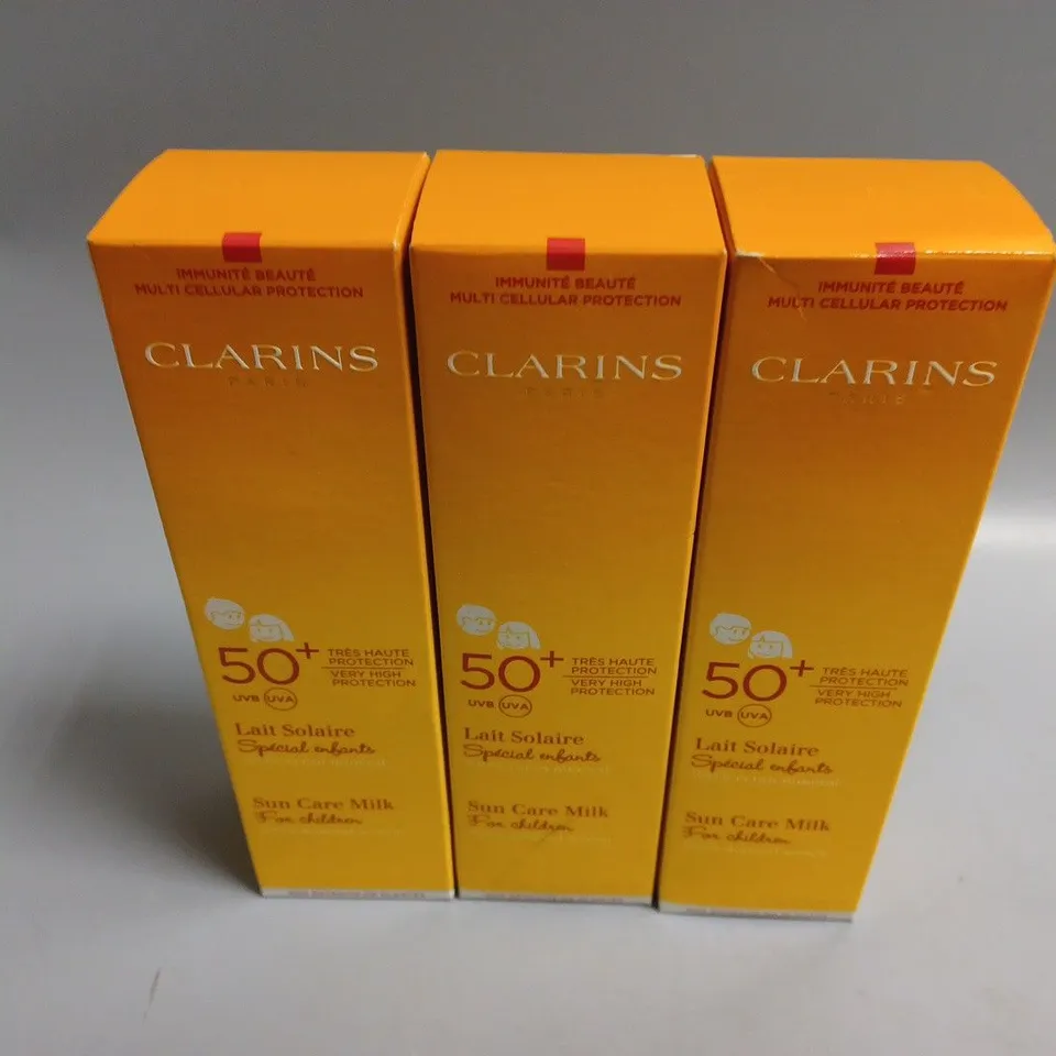 3 BOXED CLARINS 50+ SUN CARE MILK (3 x 150ml)