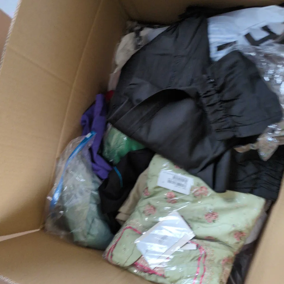 RANDOM ASSORTED BOX OF CLOTHING WOMEN/MENS/KIDS SIZES VARY: BLACK V-NECK TOP WITH TURQUOISE TRIM, BEIGE TROUSERS & PACKAGED GREEN FLORAL GARMENT (3 ITEMS)