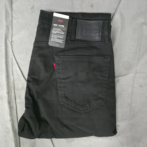 LEVIS 502 TAPER JEANS IN BLACK SIZE 38/34