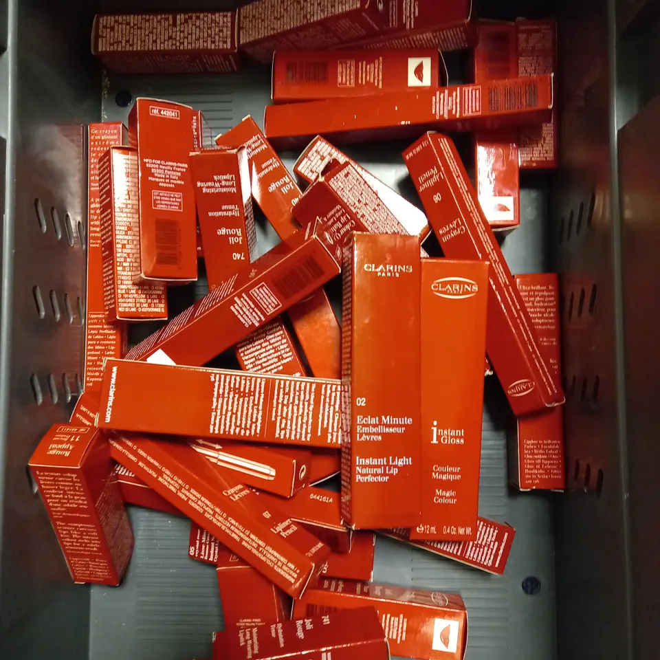 LOT OF APROX 30 ASSORTED CLARINS PARIS LIP CARE/MAKEUP PRODUCTS