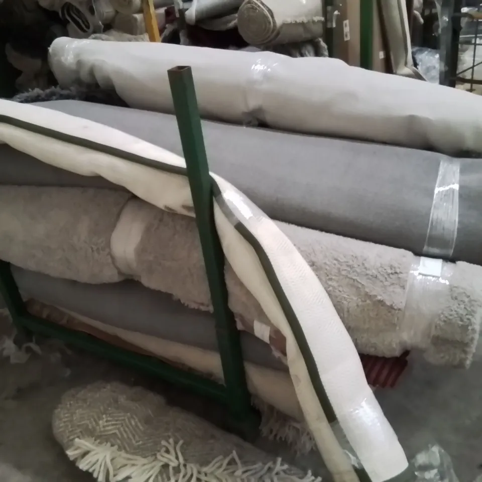 STILLAGE OF APPROXIMATELY 20 QUALITY DESIGNER RUGS