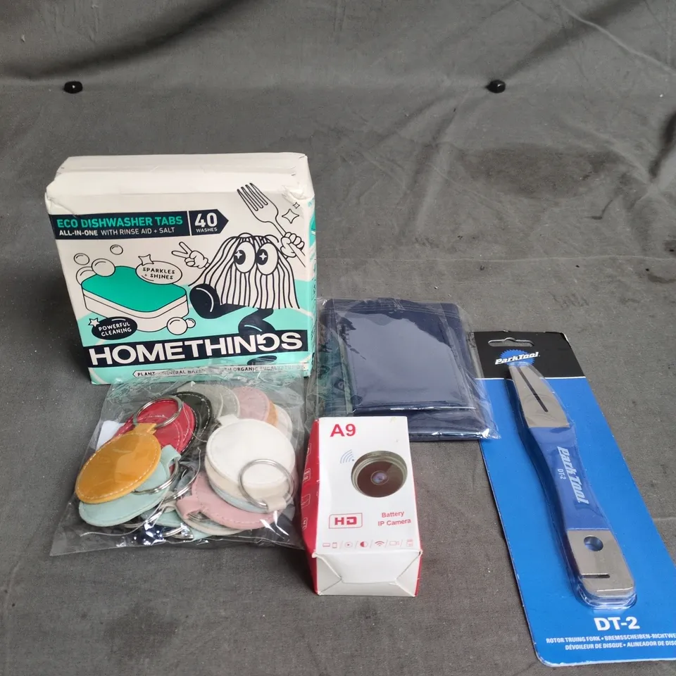 APPROXIMATELY 15 ASSORTED HOUSEHOLD ITEMS TO INCLUDE ECO DISHWASHER TABLETS, A9 BATTERY IP CAMERA AND A ROTOR TRUING FORK