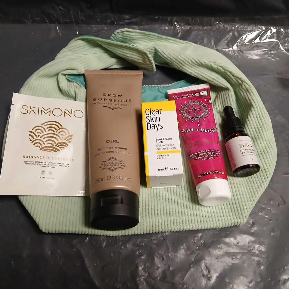 SIX ASSORTED COSMETICS PRODUCTS TO INCLUDE; GLOSSYBOX BAG, SKIMONO RADIANCE RECOVERY EYE MASK, GROW GORGEOUS CURL DEFINING SHAMPOO, CLEAR SKIN DAYS SPOT ERASER STICK, BUBBLE T BODY WASH AND MAULI SUPR