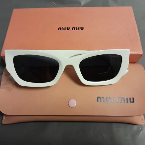 BOXED PAIR OF MIU MIU WHITE CHUNKY FRAMED GLASSES