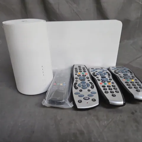 APPROXIMATELY 8 ASSORTED ELECTRICAL PRODUCTS TO INCLUDE PLUGS , EE BOXES AND SKY REMOTES , ETC 