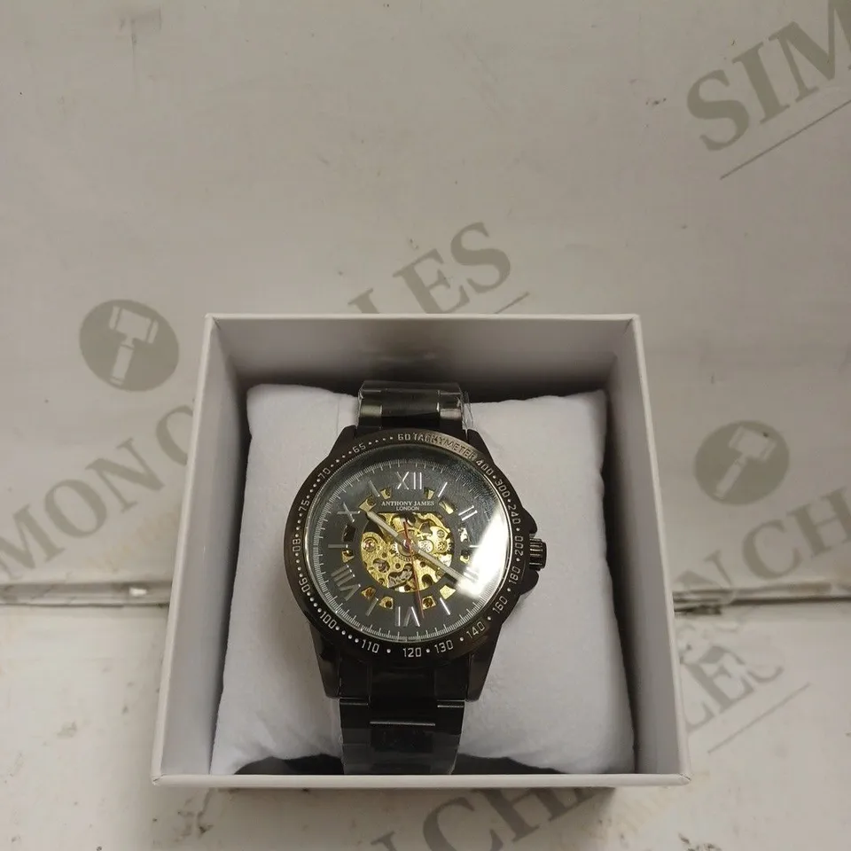 BOXED ANTHONY JAMES WATCH - AUTOMATIC - WATER RESISTANT 3ATM - SKELETON FACE - STAINLESS STEEL BLACK. 
