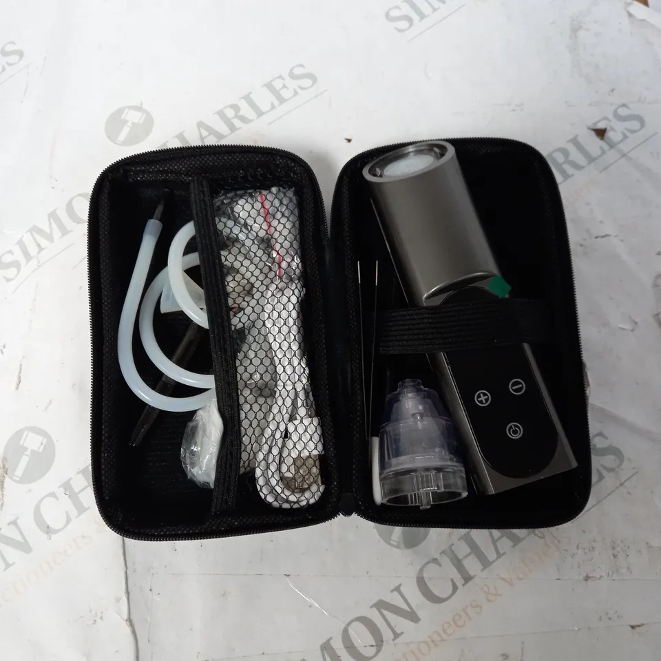 EAR WAX VACUUM REMOVAL