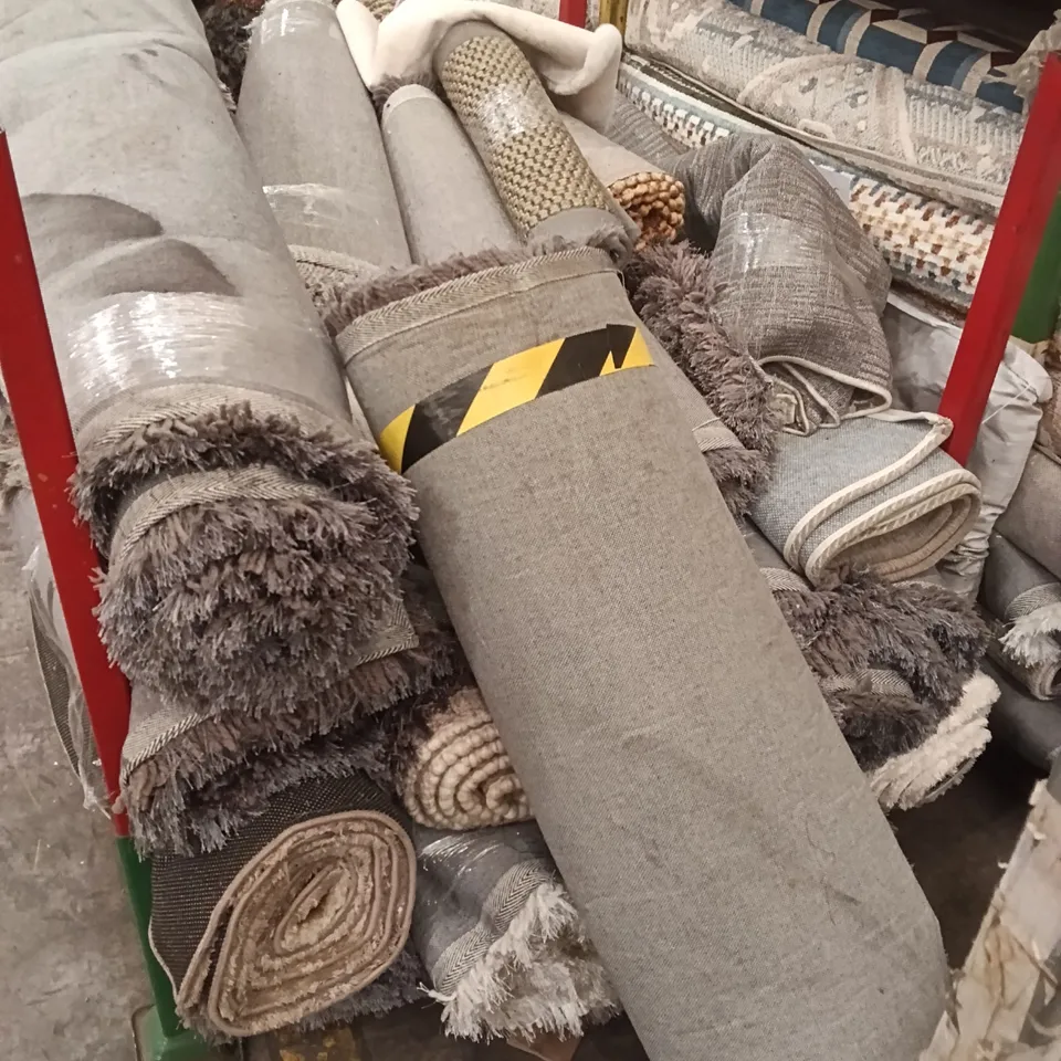 STILLAGE OF ASSORTED QUALITY RUGS APPROXIMATELY 18