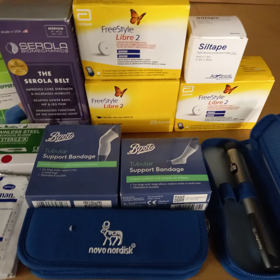LOT OF 12 ASSORTED MEDICAL ITEMS TO INCLUDE NOVOPENS, SUPPORT BANDAGES AND SEROLA BELT