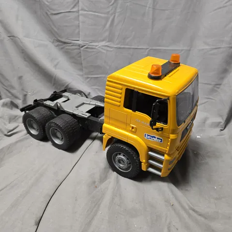 BRUDER MAN TGA 4144D TOY TRUCK – YELLOW