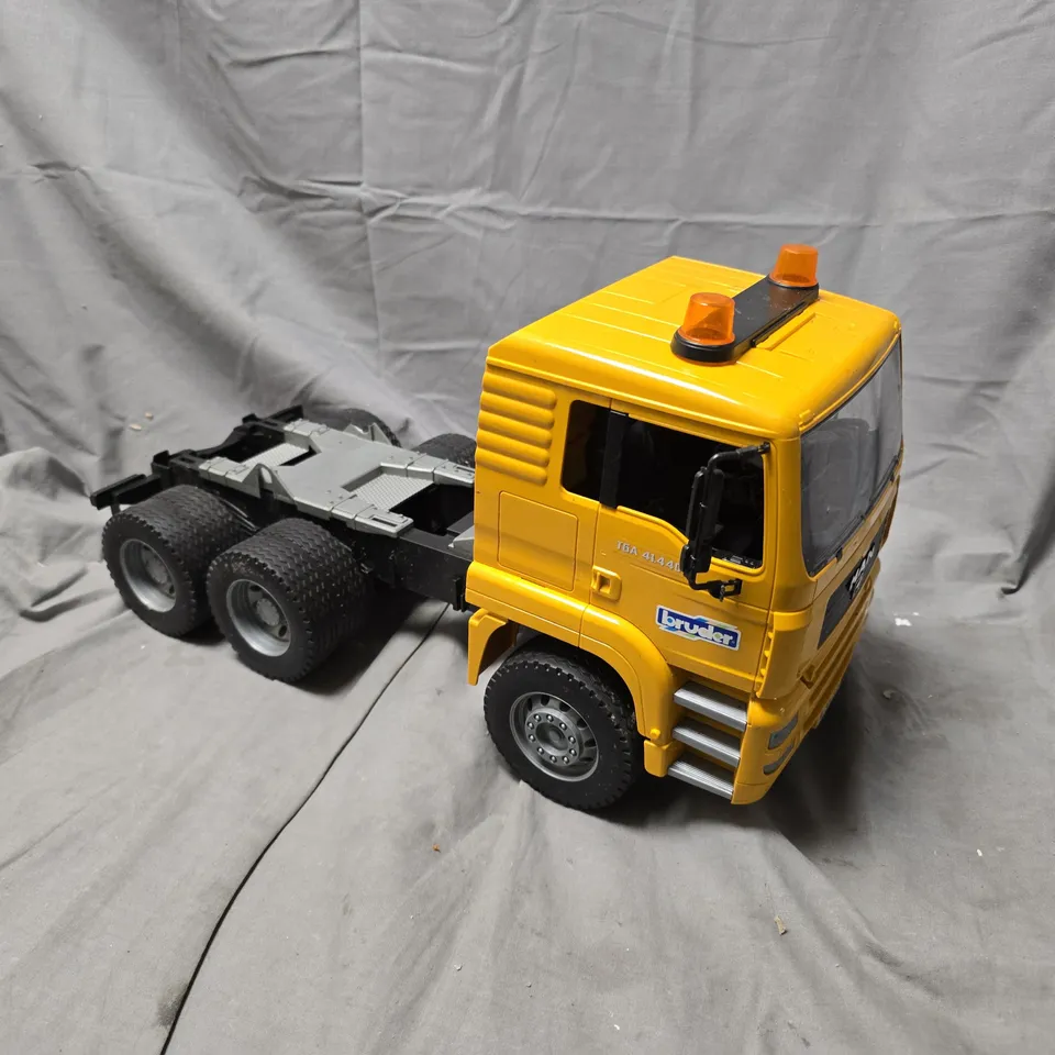 BRUDER MAN TGA 4144D TOY TRUCK – YELLOW