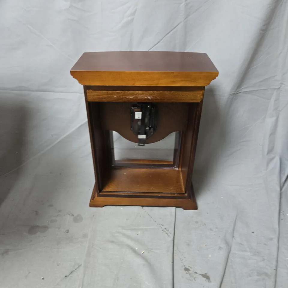 WOODEN MANTEL CLOCK WITH GLASS-FRONT DISPLAY AND BRASS DIAL