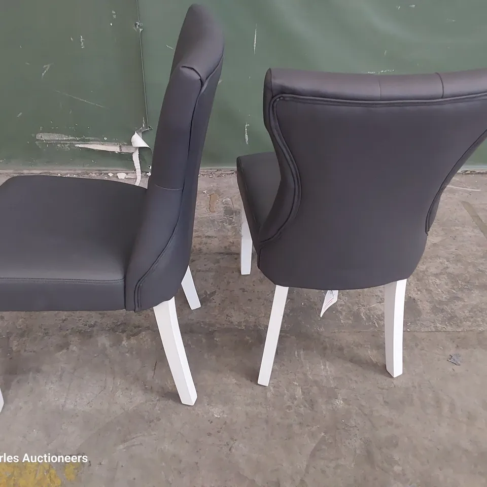PAIR OF UPHOLSTERED BUTTONED BACK DINING CHAIRS GREY PU ON WHITE PAINTED LEGS 