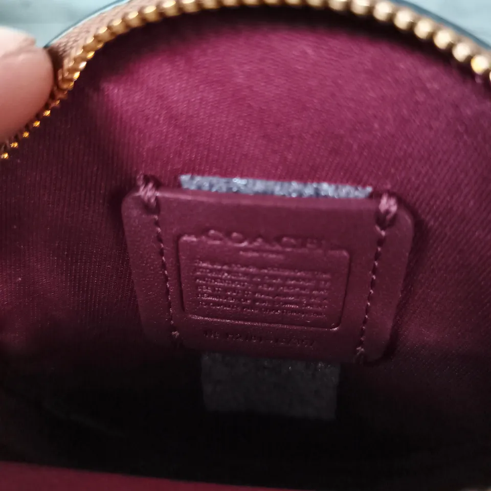 COACH CIRCLE COIN PURSE – BROWN SIGNATURE CANVAS WITH FLORAL PRINT (NEW YORK)