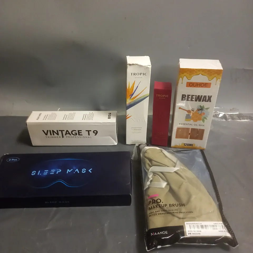 APPROXIMATELY 15 ASSORTED COSMETIC PRODUCTS TO INCLUDE TROPIC CLEANSER, MAKEUP BRUSH AND HAIR TRIMMER