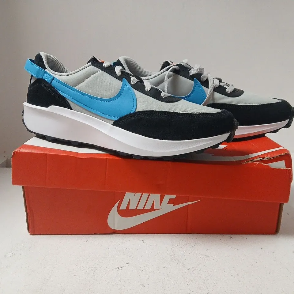 BOXED PAIR OF NIKE WAFFLE DEBUT TRAINERS IN GREY/BLUE/BLACK SIZE UK 9