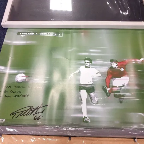 SIGNED PICTURE OF GEOFF HURST SCORING ENGLAND'S FOURTH GOAL TO SEAL THE WORLD CUP FOR ENGLAND