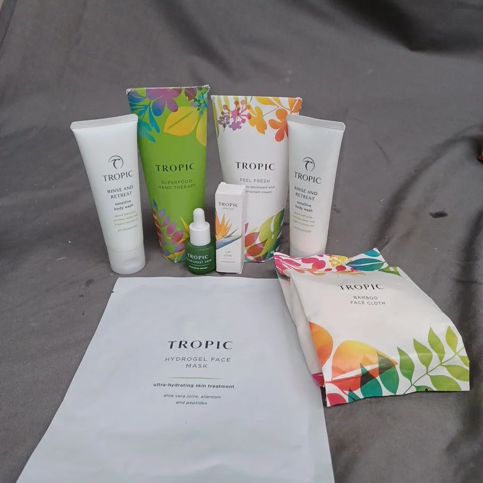 LOT OF 8 TROPIC SKIN CARE PRODUCTS TO INCLUDE BODY WASH, FACE SHEET MASK AND A BAMBOO CLOTH