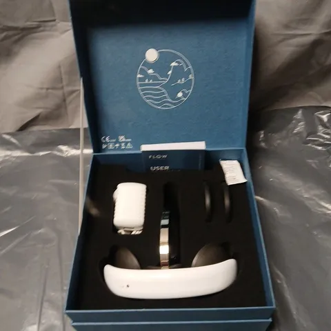 FLOW WELLNESS NEUROSCIENCE PORTABLE WIRELESS HEADSET. DEVICE IN BLUE BOX